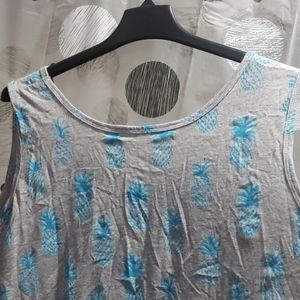 Woman within Pineapple tank